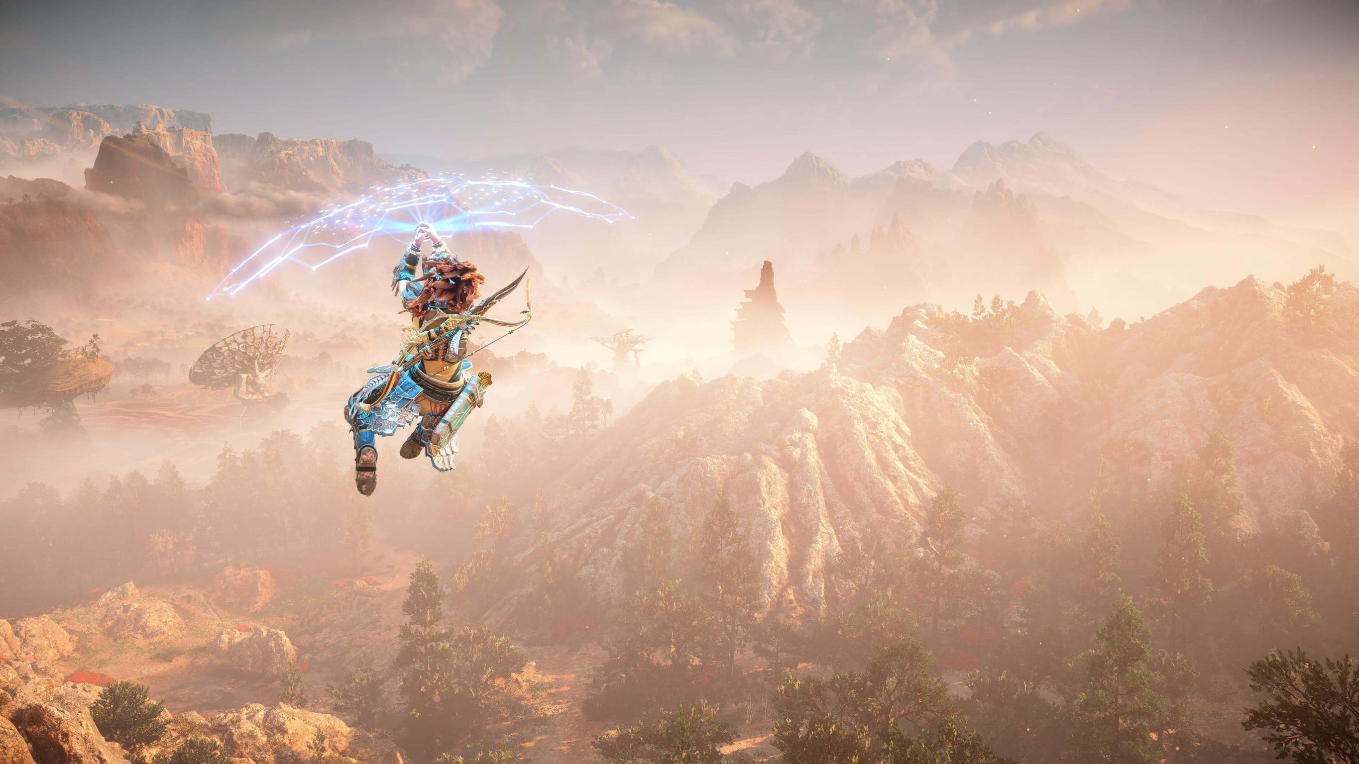 Horizon games heroine, Aloy, perched atop a hill, overlooking a mountainous landscape at dusk